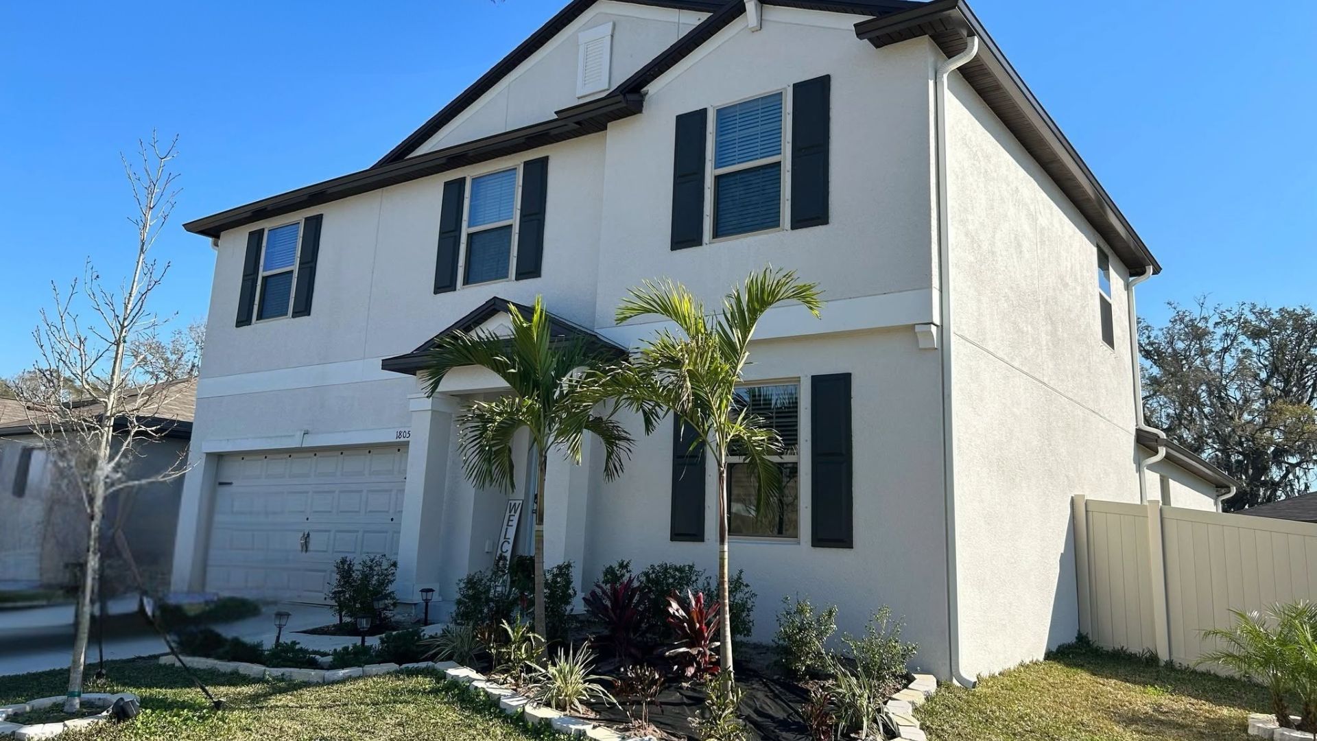 Downspout placement planned around a Tampa Bay property