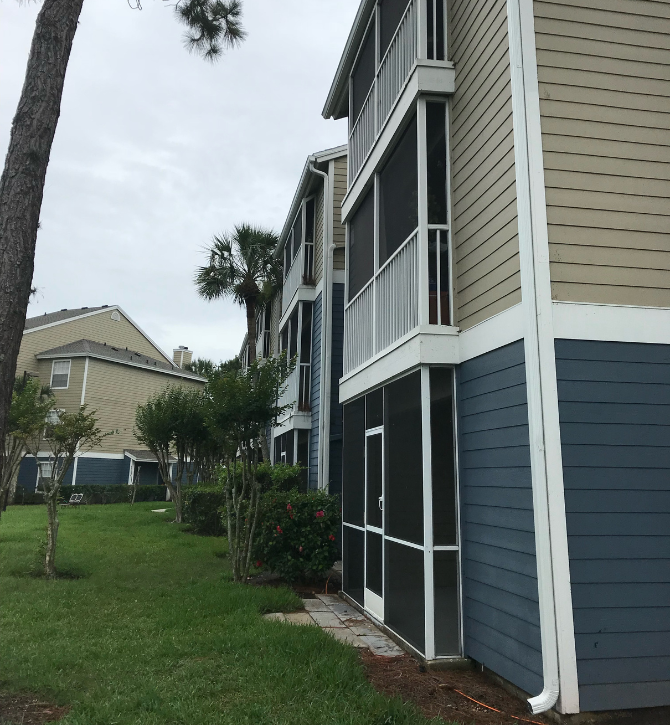 Professional seamless gutter system on Florida property