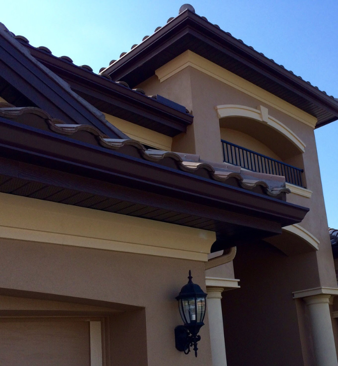 Seamless gutter installation protecting a Tampa Bay property